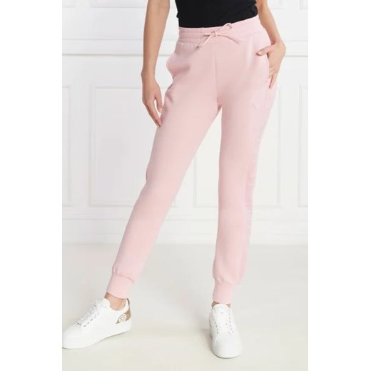 GUESS ACTIVE Spodnie dresowe | Regular Fit ze sklepu Gomez Fashion Store w kategorii Spodnie damskie - zdjęcie 172960681