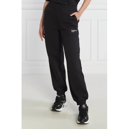 CALVIN KLEIN JEANS Spodnie dresowe GALAXY PRINT | Comfort fit ze sklepu Gomez Fashion Store w kategorii Spodnie damskie - zdjęcie 172962011