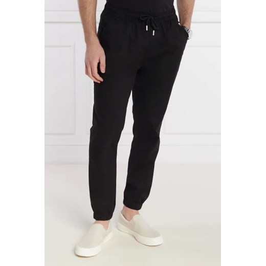 Tommy Jeans Spodnie jogger AUSTIN | Regular Fit ze sklepu Gomez Fashion Store w kategorii Spodnie męskie - zdjęcie 172964000