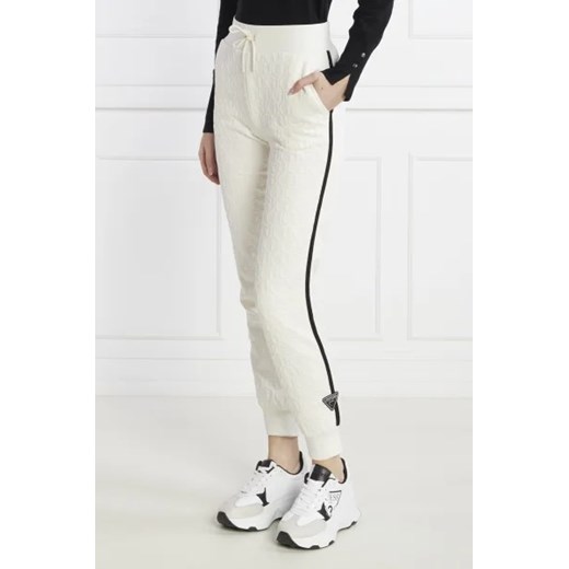 GUESS ACTIVE Spodnie dresowe CHERI | Regular Fit ze sklepu Gomez Fashion Store w kategorii Spodnie damskie - zdjęcie 172964910
