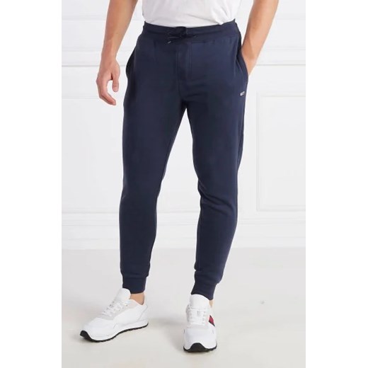 Tommy Jeans Spodnie dresowe TJM SLIM FLEECE SWEA | Slim Fit ze sklepu Gomez Fashion Store w kategorii Spodnie męskie - zdjęcie 172970821
