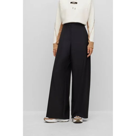 BOSS BLACK Wełniane spodnie Tilwida Alica | flare fit ze sklepu Gomez Fashion Store w kategorii Spodnie damskie - zdjęcie 172971531