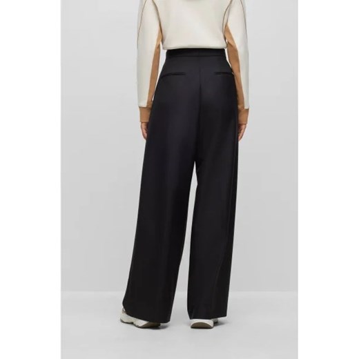 BOSS BLACK Wełniane spodnie Tilwida Alica | flare fit ze sklepu Gomez Fashion Store w kategorii Spodnie damskie - zdjęcie 172971532