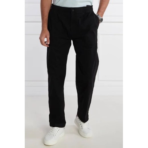 CALVIN KLEIN JEANS Spodnie BADGE TRIM WOVEN PANT | Regular Fit ze sklepu Gomez Fashion Store w kategorii Spodnie męskie - zdjęcie 172973160