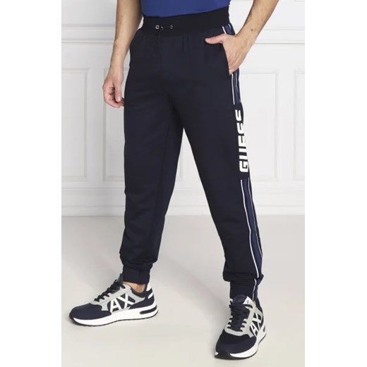GUESS ACTIVE Spodnie dresowe JERROD | Regular Fit ze sklepu Gomez Fashion Store w kategorii Spodnie męskie - zdjęcie 172977392