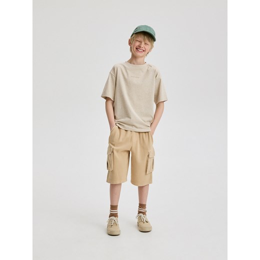 Beżowe spodenki chłopięce Reserved 