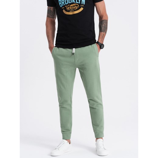 Spodnie męskie dresowe typu jogger - zielone V3 OM-PABS-0173 ze sklepu ombre w kategorii Spodnie męskie - zdjęcie 173125430