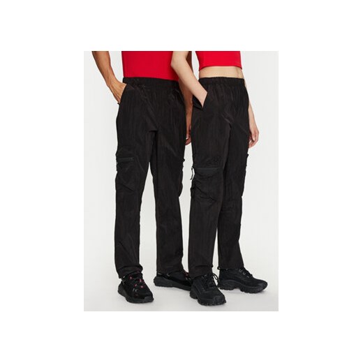 Rains Spodnie materiałowe Kano Pants Regular 19200 Czarny Regular Fit ze sklepu MODIVO w kategorii Spodnie damskie - zdjęcie 173138773