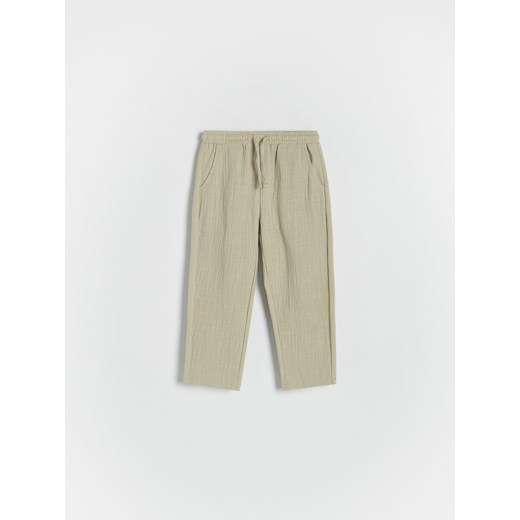 Reserved - Dzianinowe spodnie chino - oliwkowy ze sklepu Reserved w kategorii Spodnie chłopięce - zdjęcie 173139994