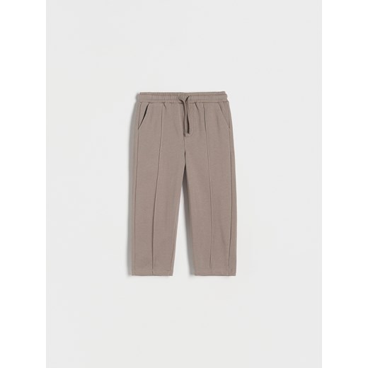 Reserved - Dresowe spodnie z przeszyciami - brązowy ze sklepu Reserved w kategorii Spodnie i półśpiochy - zdjęcie 173154303