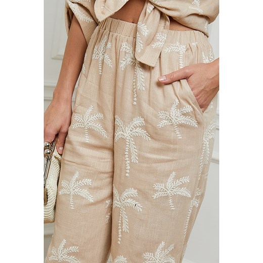 Spodnie damskie Fleur De Lin w kwiaty beżowe boho 