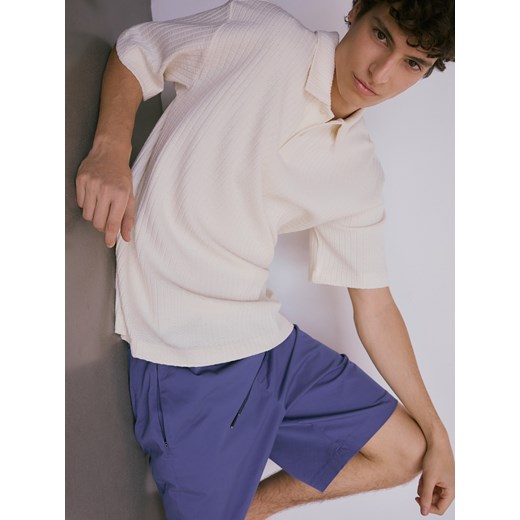 Reserved - Bawełniane szorty jogger - niebieski ze sklepu Reserved w kategorii Spodenki męskie - zdjęcie 173406210