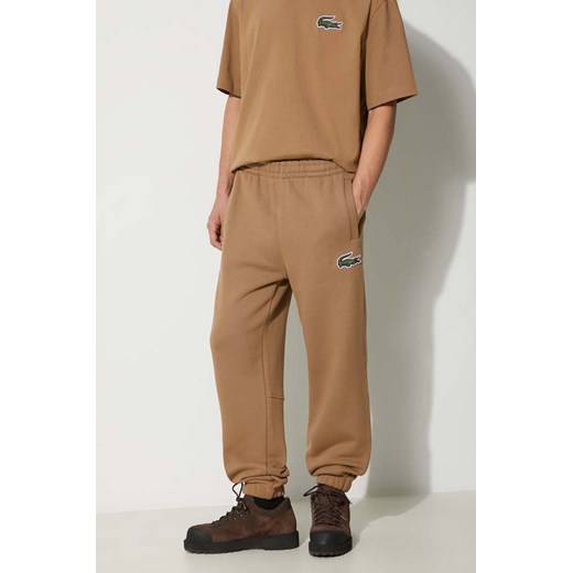 Lacoste spodnie dresowe bawełniane kolor brązowy gładkie ze sklepu PRM w kategorii Spodnie męskie - zdjęcie 173408314