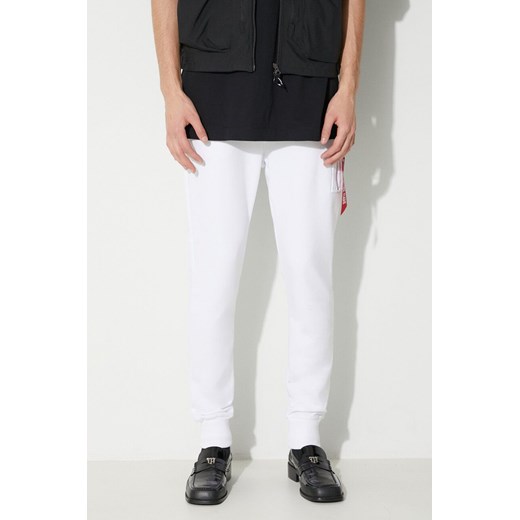 Alpha Industries spodnie dresowe kolor biały gładkie ze sklepu PRM w kategorii Spodnie męskie - zdjęcie 173408334