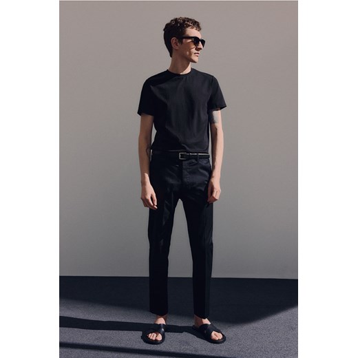 H & M - Bawełniane spodnie Slim Fit - Czarny ze sklepu H&M w kategorii Spodnie męskie - zdjęcie 173452910