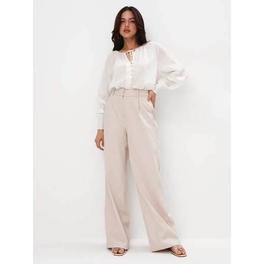 Mohito - Spodnie z szeroką nogawką - beżowy Mohito 36 Mohito