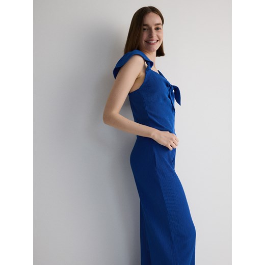 Reserved - Luźne spodnie w prążek - niebieski Reserved L Reserved