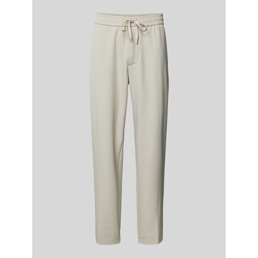 Spodnie o kroju tapered fit z tunelem ze sklepu Peek&Cloppenburg  w kategorii Spodnie męskie - zdjęcie 173555770