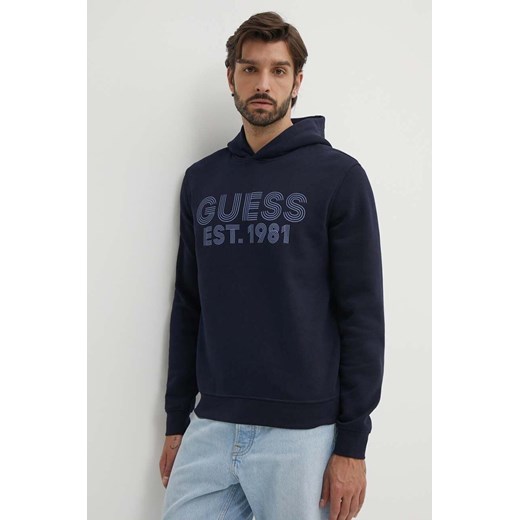 Guess bluza BEAU męska kolor granatowy z kapturem z nadrukiem M4YQ36 K9Z21 ze sklepu ANSWEAR.com w kategorii Bluzy męskie - zdjęcie 173577043