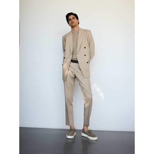 Spodnie męskie beżowe Reserved 