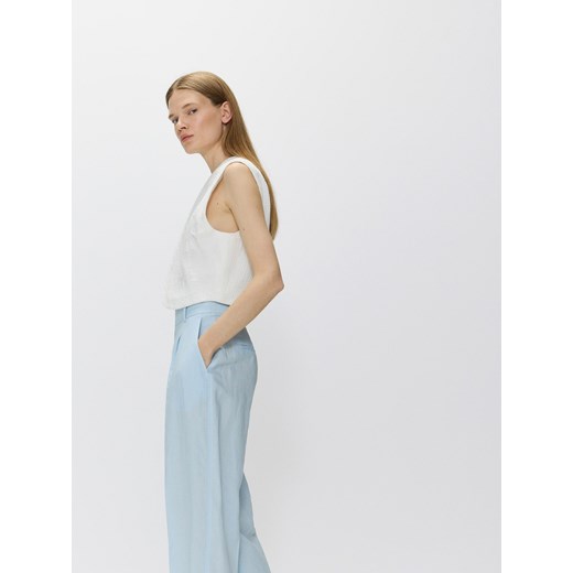 Reserved - Spodnie z lyocellem i lnem - jasnoniebieski ze sklepu Reserved w kategorii Spodnie damskie - zdjęcie 173597544