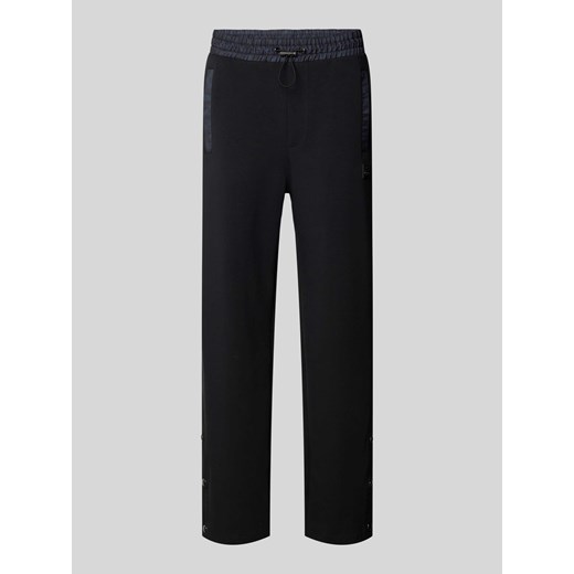 Spodnie dresowe o kroju regular fit z tunelem model ‘Dayquario’ ze sklepu Peek&Cloppenburg  w kategorii Spodnie męskie - zdjęcie 173611462
