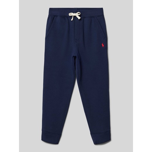 Spodnie dresowe o kroju regular fit z wpuszczanymi kieszeniami ze sklepu Peek&Cloppenburg  w kategorii Spodnie chłopięce - zdjęcie 173662273