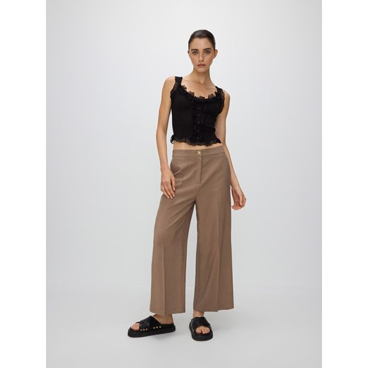 Reserved - Spodnie z wiskozą - brązowy Reserved L Reserved