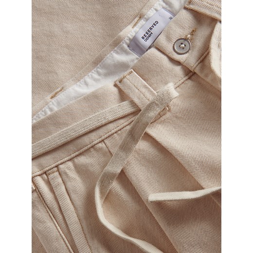 Jeansy męskie Reserved na wiosnę 