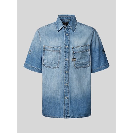 Koszula jeansowa o kroju regular fit z kieszeniami na piersi model ‘Slanted’ ze sklepu Peek&Cloppenburg  w kategorii Koszule męskie - zdjęcie 173743510