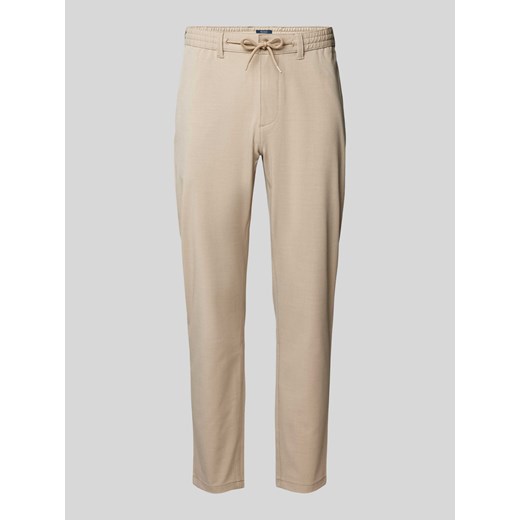 Spodnie materiałowe o kroju tapered fit z tunelem ze sklepu Peek&Cloppenburg  w kategorii Spodnie męskie - zdjęcie 173795953