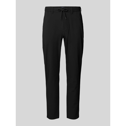 Spodnie materiałowe o kroju tapered fit z tunelem ze sklepu Peek&Cloppenburg  w kategorii Spodnie męskie - zdjęcie 173816441