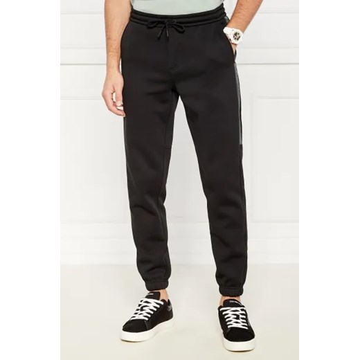 CALVIN KLEIN JEANS Spodnie dresowe | Regular Fit ze sklepu Gomez Fashion Store w kategorii Spodnie męskie - zdjęcie 173853843