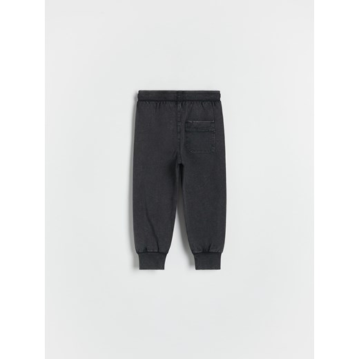 Reserved - Dresowe spodnie z efektem sprania - ciemnoszary Reserved 5-2 lata) Reserved