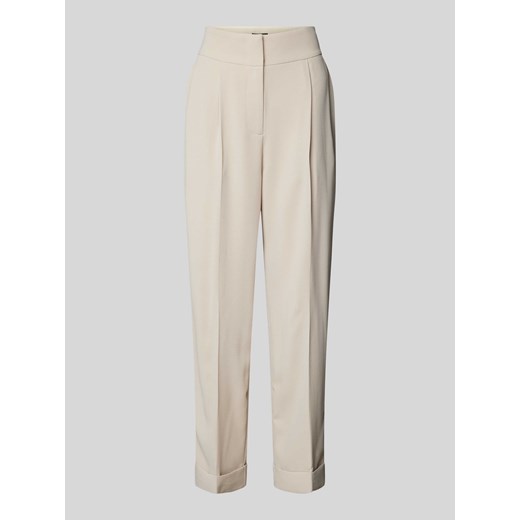 Spodnie materiałowe o kroju tapered fit z zakładkami w pasie ze sklepu Peek&Cloppenburg  w kategorii Spodnie damskie - zdjęcie 174052940