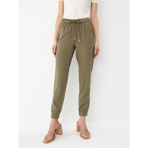 Mohito - Zielone spodnie joggery - khaki Mohito 34 Mohito