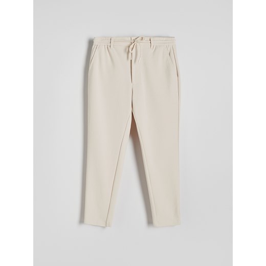Reserved - Spodnie chino slim fit - złamana biel Reserved L Reserved