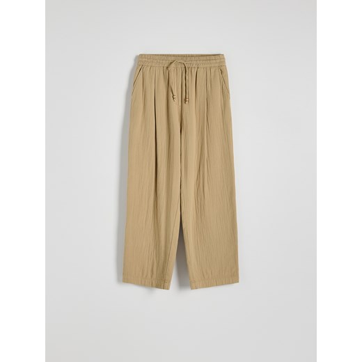 Reserved - Spodnie jogger - beżowy Reserved M Reserved