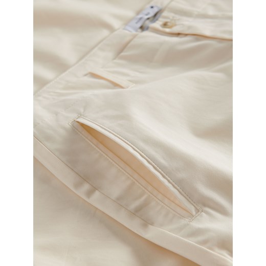 Spodnie męskie białe Reserved 