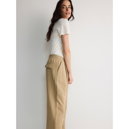 Reserved - Spodnie jogger z muślinu - beżowy Reserved XL Reserved