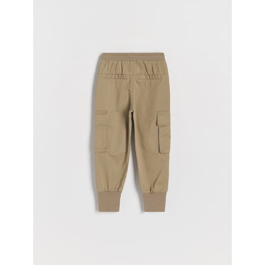 Reserved - Joggery cargo z kieszeniami - beżowy Reserved 134 (8 lat) Reserved