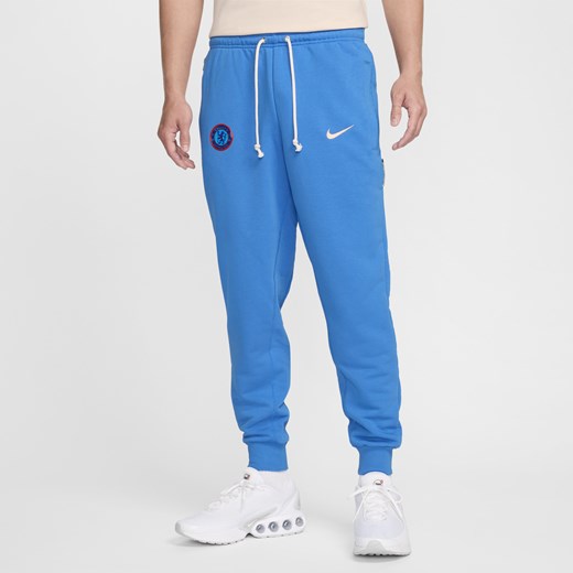Spodnie męskie niebieskie Nike