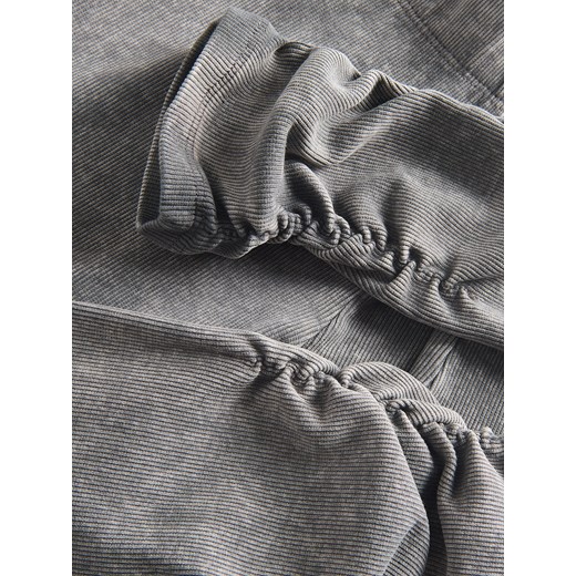 Spodnie dziewczęce Reserved z elastanu 