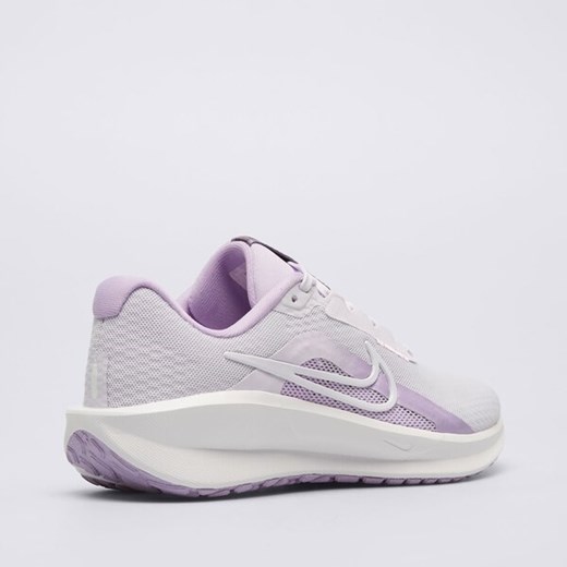 Buty sportowe damskie Nike downshifter na wiosnę białe wiązane na płaskiej podeszwie