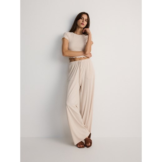 Reserved - Spodnie dresowe - kremowy ze sklepu Reserved w kategorii Spodnie damskie - zdjęcie 174609192