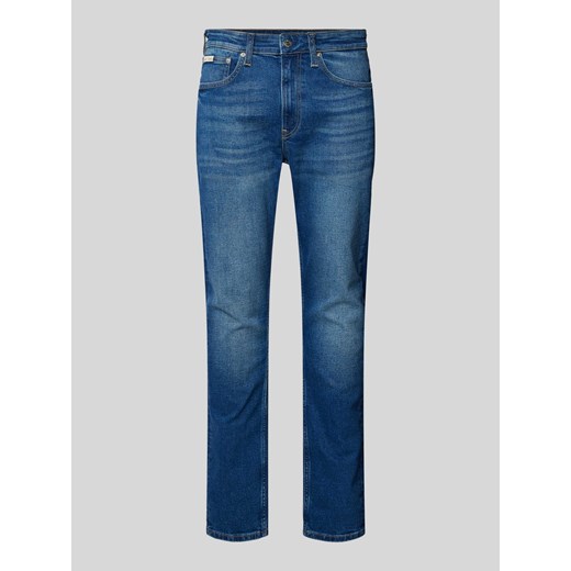 Jeansy o kroju slim tapered fit z naszywką z logo ze sklepu Peek&Cloppenburg  w kategorii Jeansy męskie - zdjęcie 174638260