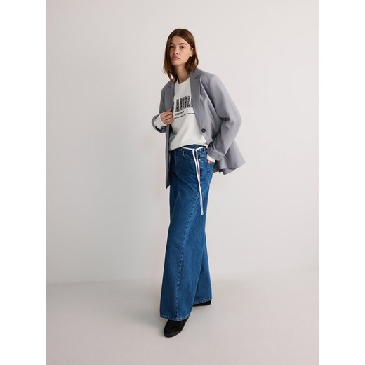 Niebieskie jeansy damskie Reserved 