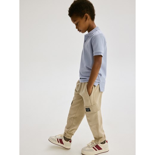 Reserved - Joggery cargo z kieszeniami - beżowy Reserved 152 (11 lat) Reserved