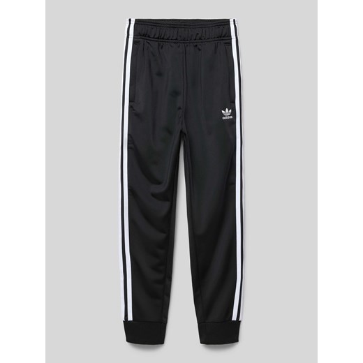 Spodnie dresowe o kroju regular fit z wyhaftowanym logo ze sklepu Peek&Cloppenburg  w kategorii Spodnie chłopięce - zdjęcie 174806873