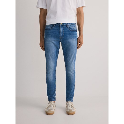 Reserved - Jeansy skinny z efektem sprania - niebieski Reserved 29 Reserved